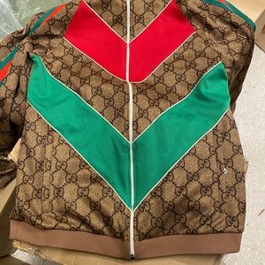 Used Gucci jumpsuit Jacket/Pants brand new condition!